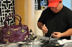 Paco making accessories next to Purple Kenzie Bag