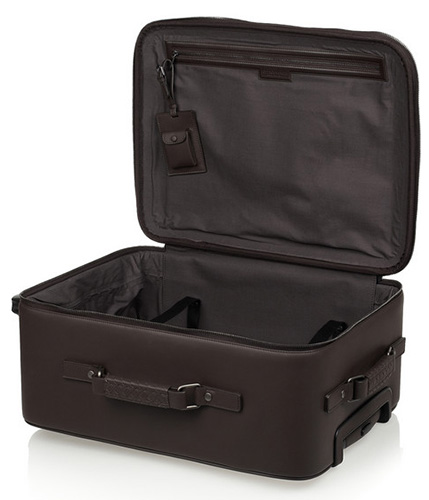 I d love to travel with the Bottega Veneta leather travel trolley