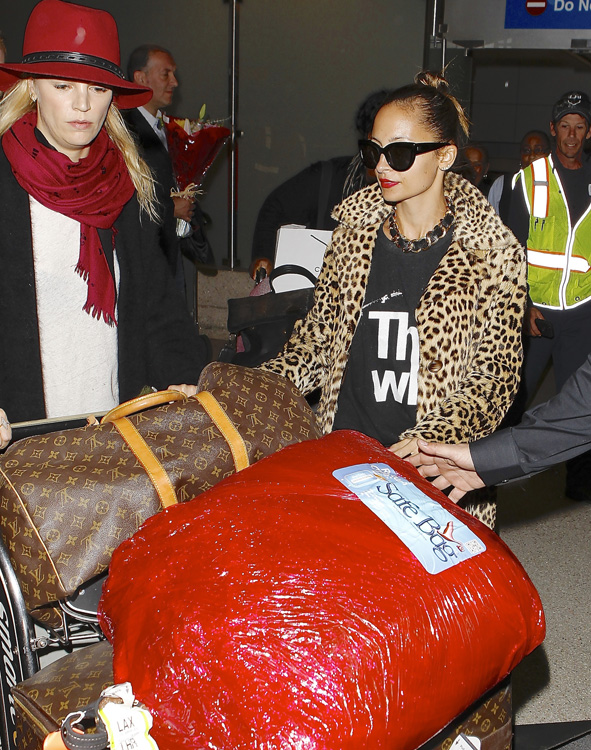 Celebrities and Louis Vuitton Luggage 11