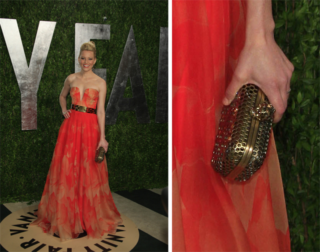 Elizabeth Banks carries Alexander McQueen to the Vanity Fair party.