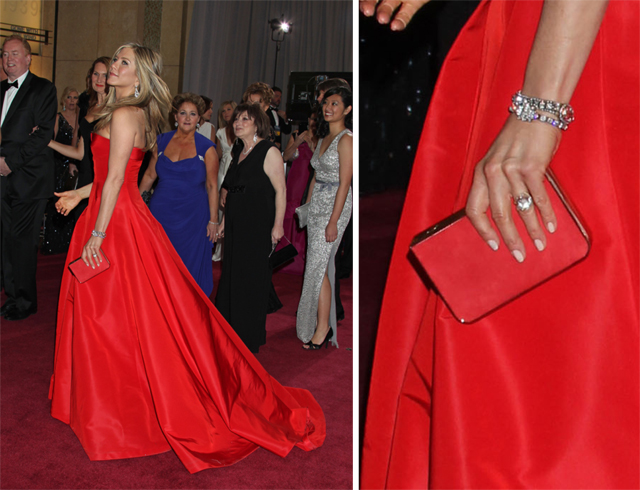 Jennifer Aniston carries a Ferragamo clutch to the 2013 Academy Awards