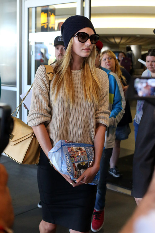 Candice Swanepoel carries a beige Chloe Sally Bag at LAX (1)