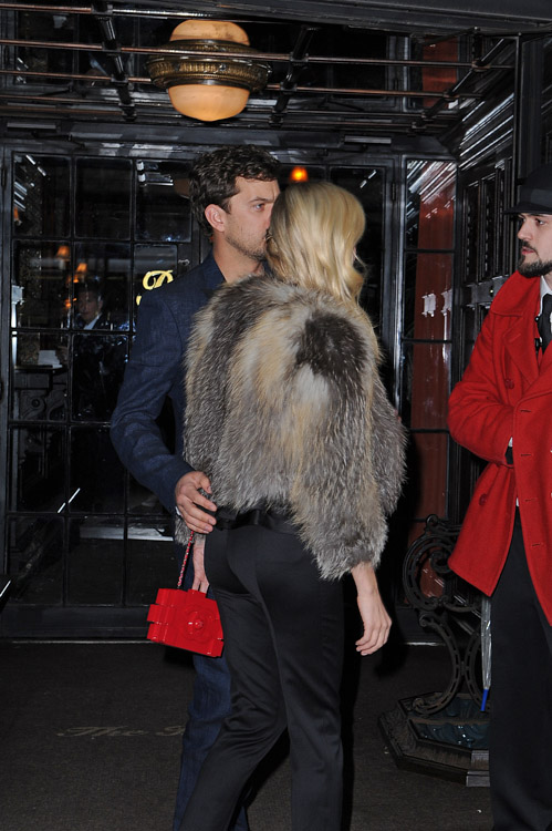 Diane Kruger carries a red Chanel Lego Clutch while leaving her NYC hotel (2)
