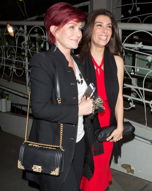 Sharon Osbourne carries a black Chanel Boy Bag with gold accents (3)