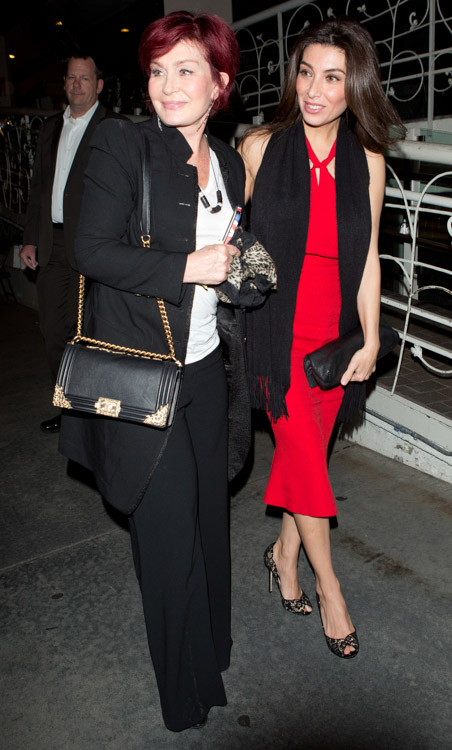 Sharon Osbourne carries a black Chanel Boy Bag with gold accents (2)