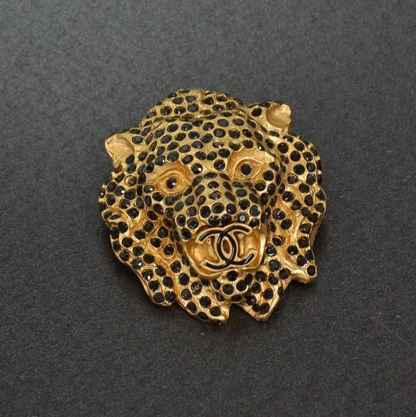Chanel Gold Tone Lion Motif Black Line Stone Brooch