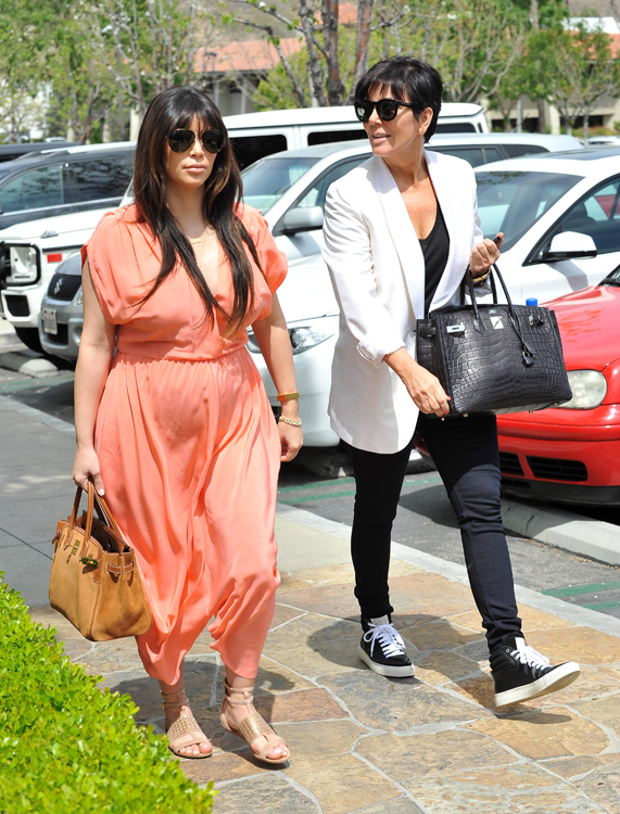 Kim Kardashian carries an Hermes Grizzly Suede Birkin and Kris Jenner carries an Hermes Crocodile Birkin (4)