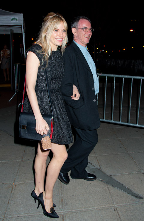 Sienna Miller carries a red and black Delvaux Madame Bag to a Vanity Fair party (2)