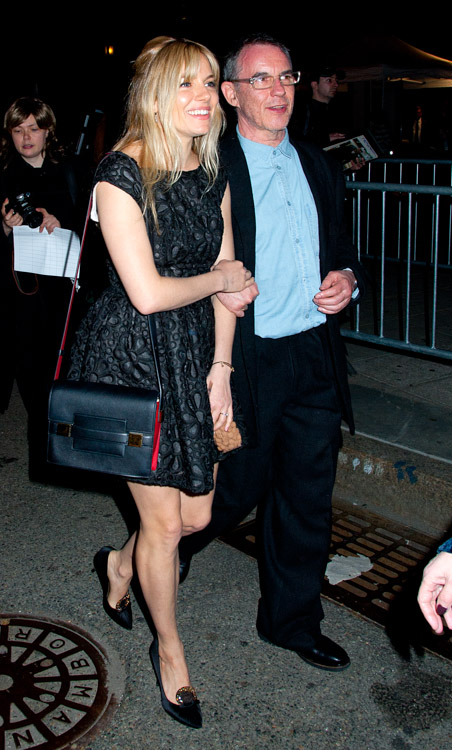 Sienna Miller carries a red and black Delvaux Madame Bag to a Vanity Fair party (4)