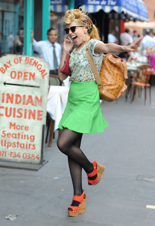 Paloma Faith carries an MCM logo backpack in London (1)