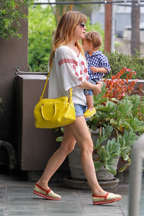 Selma Blair carries a yellow Saint Laurent Classic Duffel Bag (3)