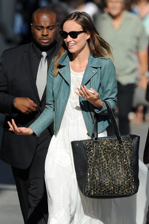 Olivia Wilde Supports Her Fianc While Carrying a Christian