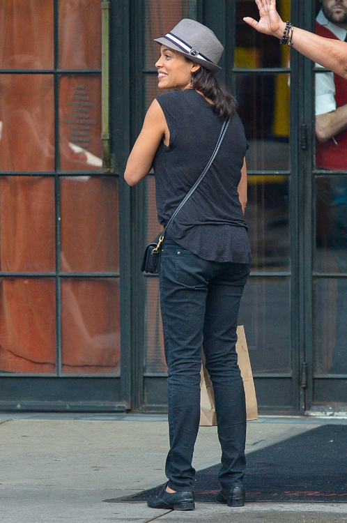 Rosario Dawson carries a Coach Legacy Penny Shoulder Bag in black (1)