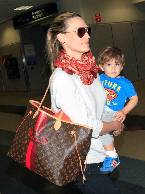 Molly Sims Returns from Vacation with Customized Louis Vuitton - PurseBlog