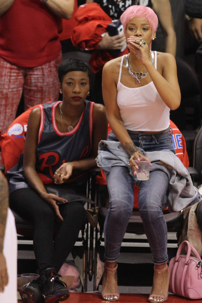 Rihanna Carries Pink Givenchy to Match Her Pink Wig PurseBlog