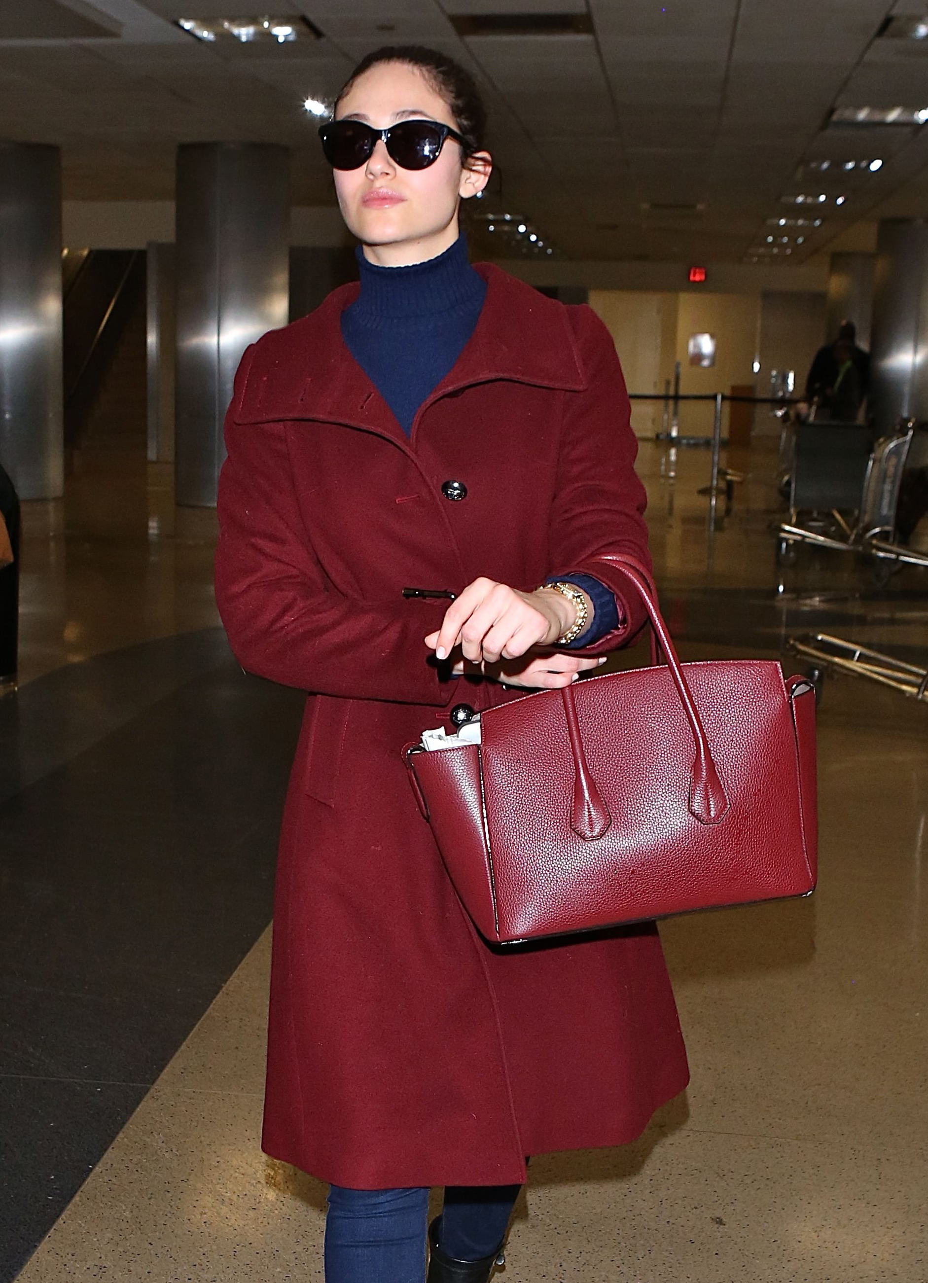 Emmy Rossum looks elegant as she arrives in Los Angeles at LAX