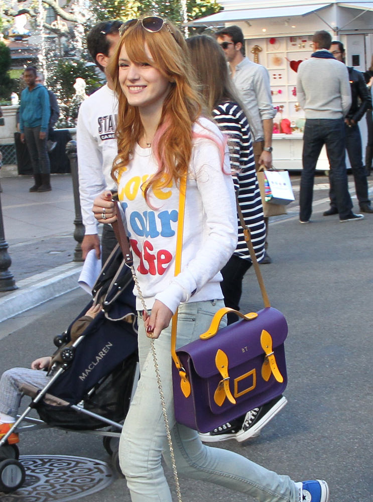 Bella Thorne goes shopping with her puppy and boyfriend at The Grove, Hollywood