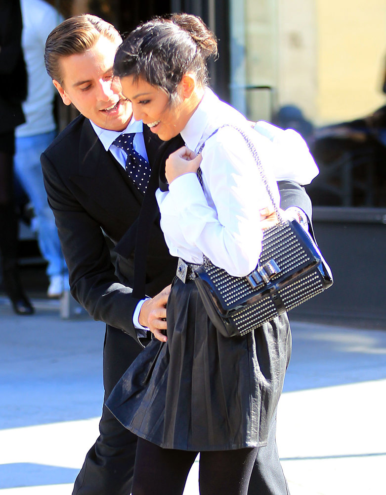 Scott Disick sweeps Kourtney Kardashian off her feet during a romantic walk in the Meatpacking District in NYC