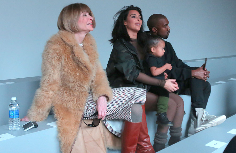 Kim Kardashian, Kanye West, and daughter all chat with Anna Wintour and watch his fashion show NYC