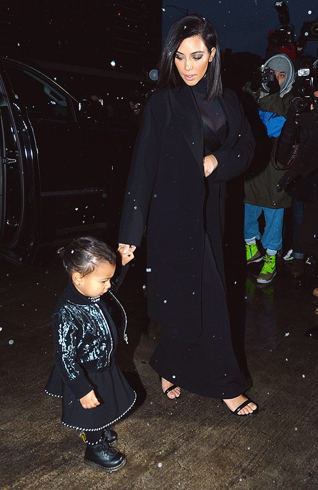Kim Kardashian and daughter North West spotted leaving their NYC apartment building.