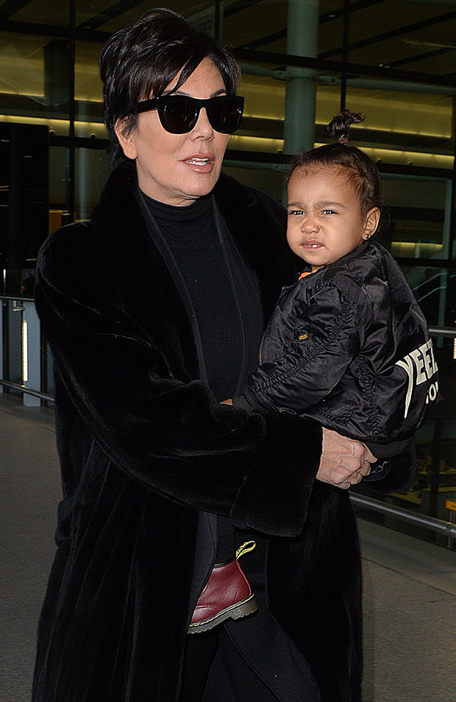 Kris Jenner and North West arriving at Heathrow airport.