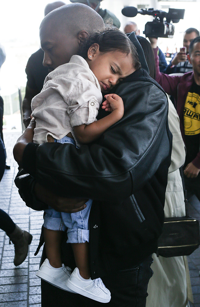 Kim Kardashian, Kanye West and North West seen at LAX airport