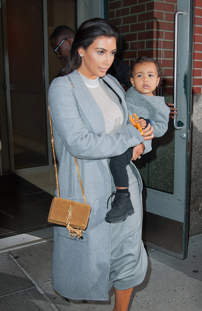 Kim Kardashian and North West leaving their apartment together in New York City
