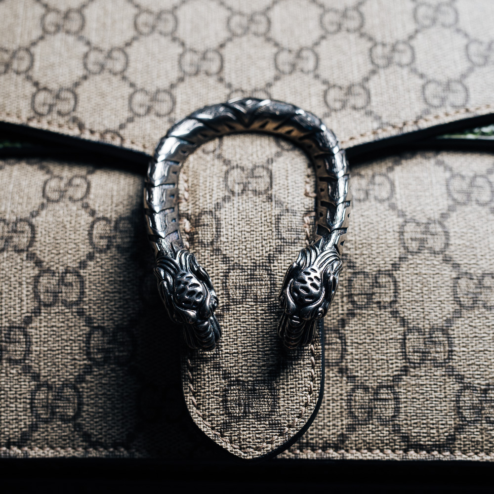 Gucci Dionysus GG Supreme Python Shoulder Bag, $2,900 via Gucci