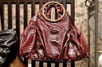 Jane August 57th Street in Maroon Python ($3,080)