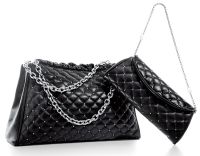 Tiffany Brady chain tote | $1,595 and Tiffany Sadie clutch in quilted onyx lambskin with studs | $795
