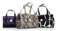 Tiffany Manhattan satchels: small in violet glazed crocodile | $12,500, natural snakeskin | $2,495, giraffe printed | $1,895