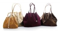 TRT (Tiffany Reversible Tote), from left: suede/metallic leather in camel/light gold, garnet/garnet, espresso/espresso | $395 for small, $595 for large