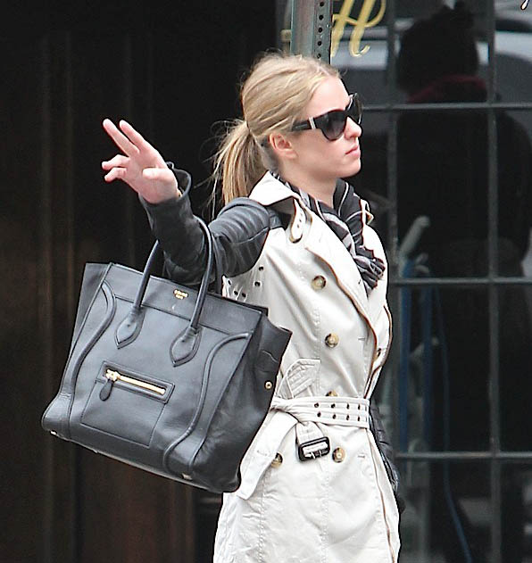 Just Can't Get Enough: Rosie Huntington-Whiteley Always Turns to Mid-Size  Black Bags - PurseBlog