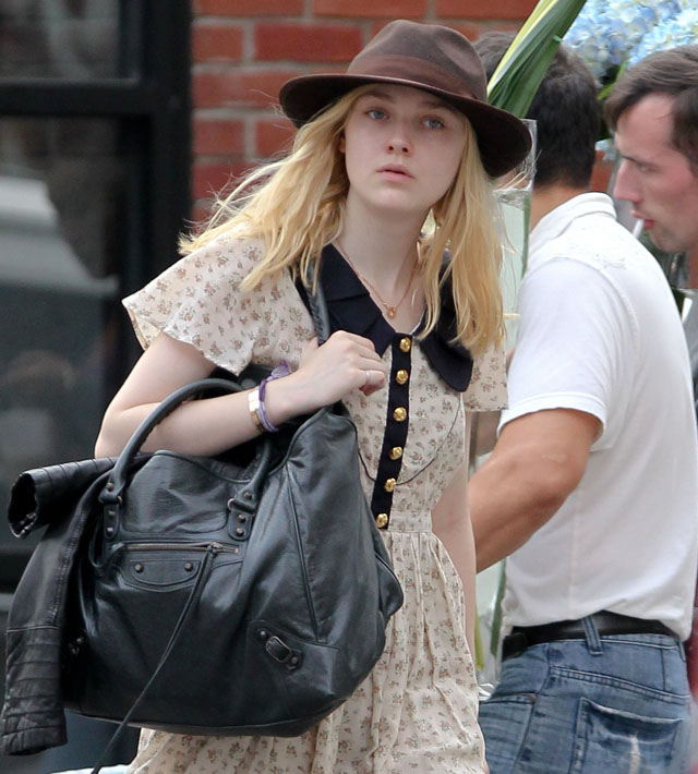 Dakota Fanning enjoys NYC's warm weather with a Celine bag - PurseBlog