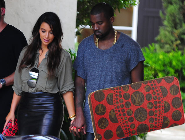 Kim Kardashian Returns To Paris In Louis Vuitton Men's Shirt