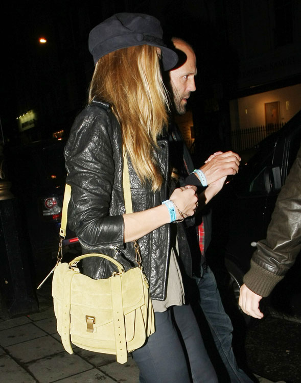 Just Can't Get Enough: Rosie Huntington-Whiteley Always Turns to Mid-Size  Black Bags - PurseBlog