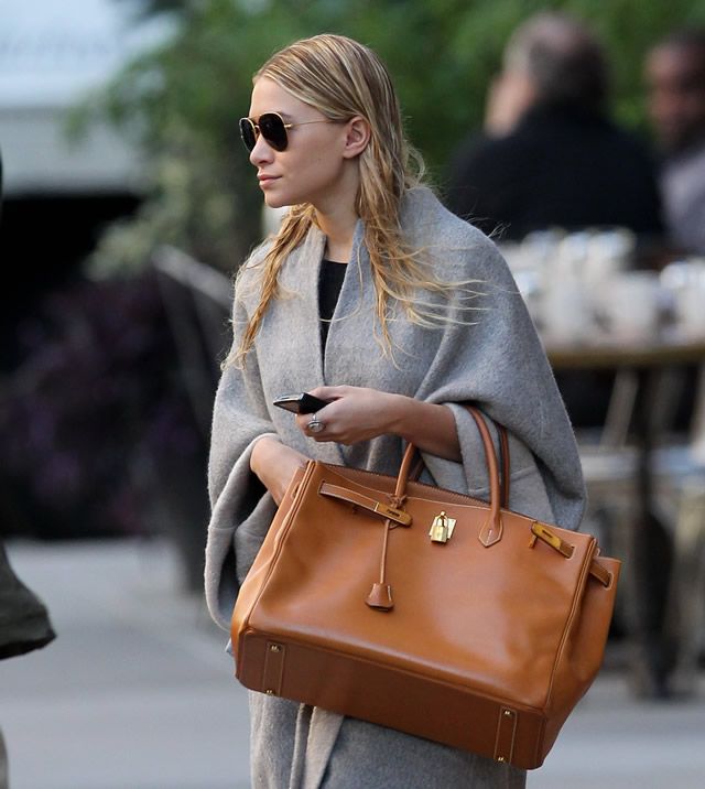 Celebrities Carrying Hermès Birkin Bags Through the Years, Photos – WWD