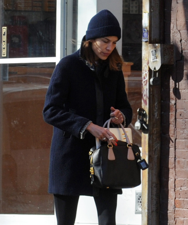 Alexa Chung wheels a Louis Vuitton suitcase around Manhattan - PurseBlog