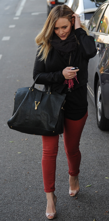 Hilary Duff Uses Goyard as a Baby Bag - PurseBlog