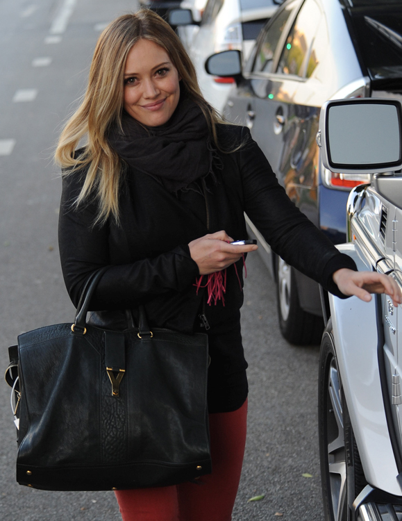 Hilary Duff Uses Goyard as a Baby Bag - PurseBlog