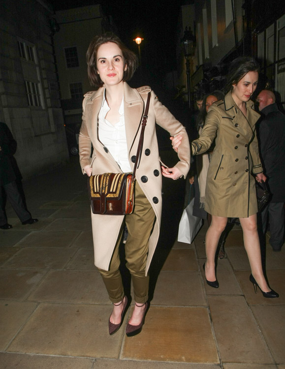 Michelle Dockery carries Burberry in 