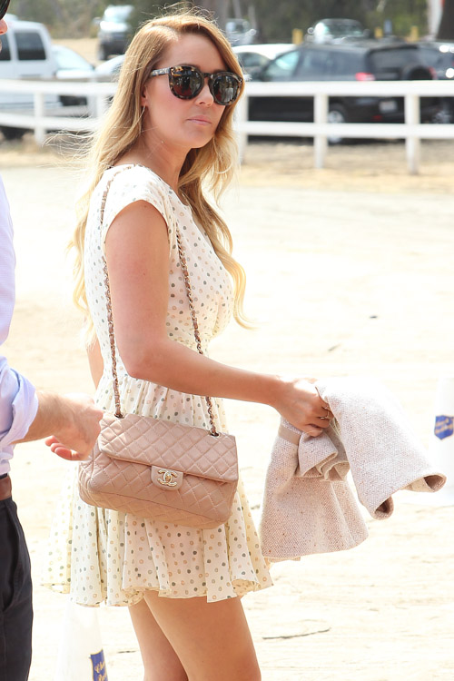 Lauren Conrad steps out carrying TWO designer handbags