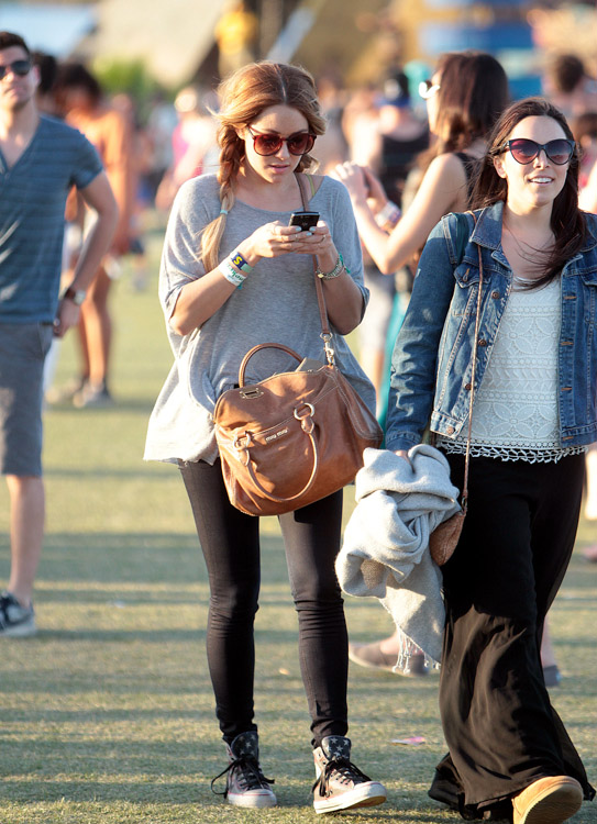 Lauren Conrad steps out carrying TWO designer handbags