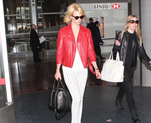 January Jones carries a black Givenchy Lucrezia bag at Roissy Airport in Paris (5)