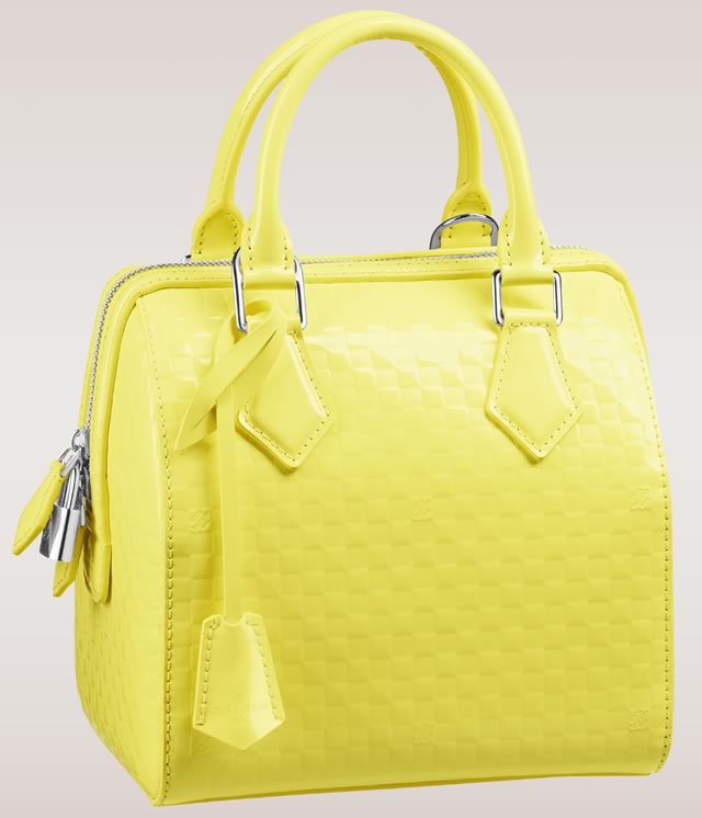 Sold at Auction: LOUIS VUITTON Limited Edition Yellow Cube Bag Shiny Yellow  Leather With Silver - Tone Hardware , Rolled Top Handles, Two Way Zip  Closure. H 19cm x D15cm With Original