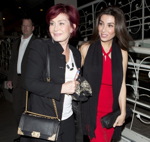 Sharon Osbourne carries a black Chanel Boy Bag with gold accents (5)