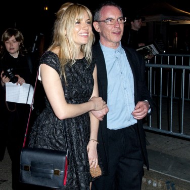 Sienna Miller carries a red and black Delvaux Madame Bag to a Vanity Fair party (5)