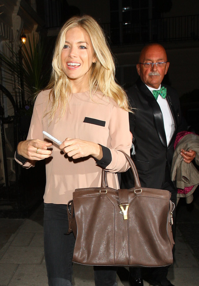 Sienna Miller carries a Delvaux bag to a Vanity Fair fete - PurseBlog