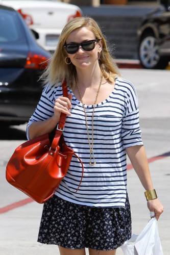 Reese Witherspoon carries a red Louis Vuitton Noe BB Bag in Los Angeles (1)
