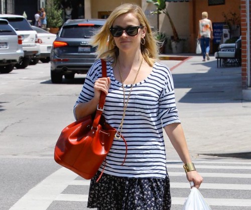 Reese Witherspoon carries a red Louis Vuitton Noe BB Bag in Los Angeles (5)